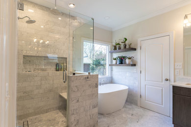 Large master double-sink bathroom photo in Charlotte with recessed-panel cabinets, white cabinets, a one-piece toilet, beige walls, a drop-in sink, a hinged shower door, gray countertops and a built-in vanity