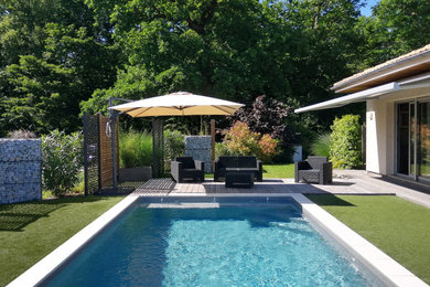 Inspiration pour une piscine design.