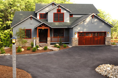 Example of a mountain style home design design in Boston