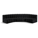 Meridian Furniture - Arc Vegan Leather Upholstered 5-Pc. U-Shaped Modular Sectional, Black - Unleash modern opulence with the Arc Vegan Leather 5pc. Sectional. Crafted for the modern connoisseur, this Sectional injects an air of refined luxury into any space. Its sleek silhouette, upholstered in supple black vegan leather, exudes timeless sophistication while the deep channel tufting adds textural intrigue, further elevating the chair's visual appeal. The modular design makes it a versatile chameleon, effortlessly adapting to your evolving needs and preferences. Whether you envision it gracing a chic living room corner, basking in the glow of a bedroom window, or adding a touch of drama to a home office, the Arc seamlessly complements your unique interior aesthetic.
