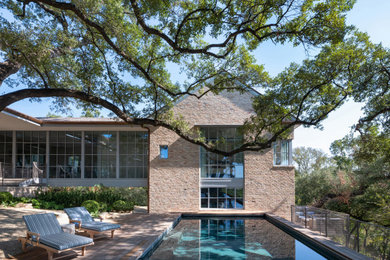 Inspiration for a transitional pool remodel in Austin