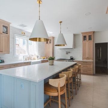 Scandinavian Kitchen with Light Oak Cabinets and Quartzite Island