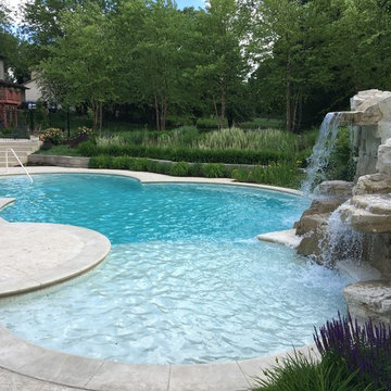 Cedar Rapids, Iowa - Custom Concrete Swimming Pool with Rock Waterfall Feature