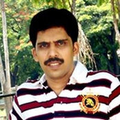 Dhanesh Thacholis foto