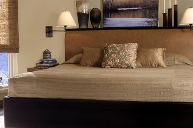 Example of a mid-sized trendy master ceramic tile and gray floor bedroom design in New York with gray walls and no fireplace