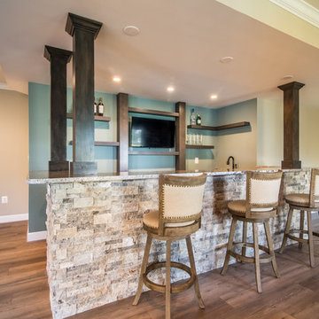 Ashburn Basement with Custom Bar, Custom Shelving, Home Gym, and Bath