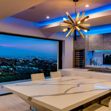 Brass Sputnik Fixture Over the Marble Table at Blue Hour