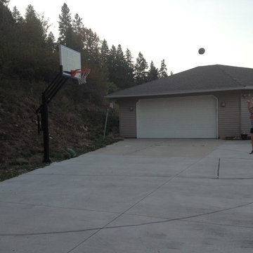 Kelly D's Pro Dunk Silver Basketball System on a 55x28 in Otis Orchards, WA