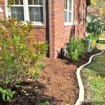 Limestone edging foundation planting