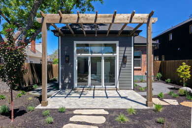 Inspiration for a small mid-century modern gray one-story house exterior remodel in Salt Lake City with a hip roof, a shingle roof and a gray roof