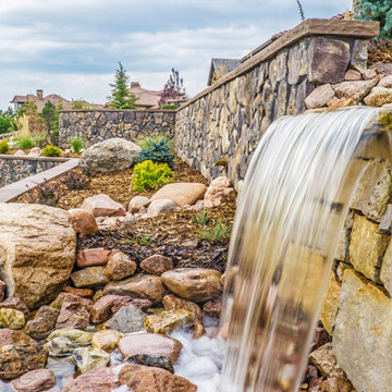 Traditional Exteriors Featuring Stone
