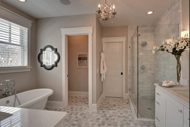 Bathroom - mid-sized transitional master gray tile, white tile and subway tile mosaic tile floor and multicolored floor bathroom idea in Philadelphia with shaker cabinets, white cabinets, beige walls, an undermount sink, quartzite countertops and a hinged shower door