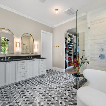 Custom Luxury Walk-In Suite with Arched Window Vanity