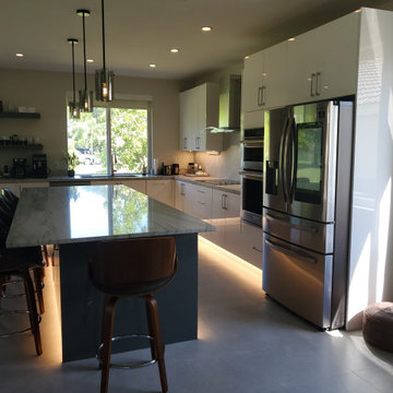 Stunning Kitchen Remodel Done in White and Gray Cabinets