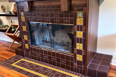 Mid-sized arts and crafts living room photo in Los Angeles with a standard fireplace and a wood fireplace surround