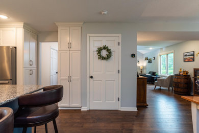 Hallway - transitional laminate floor hallway idea in Minneapolis