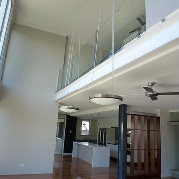 Double Height Ceiling. Mezzanine. Open Plan Kitchen, Living, Dining.