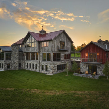 Weathered Gray and Antique Red Barnwood Paneling on Full Farmhouse Exterior
