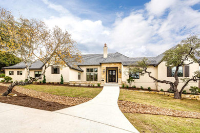 Inspiration for a french country exterior home remodel in Austin
