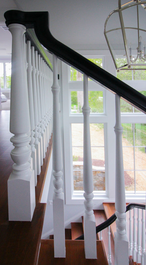 Powerful Impression by Floating Staircase in Suburban Foyer