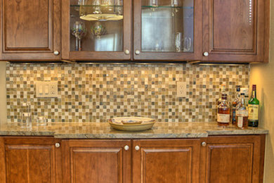 Inspiration for a transitional home bar remodel in Denver