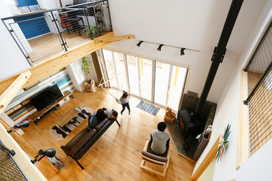 This is an example of an industrial living room in Other.