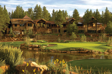 Example of a mountain style exterior home design in Phoenix
