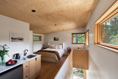 Example of a minimalist bedroom design in Seattle