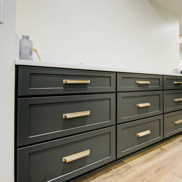 Warm & Inviting Basement Retreat with Kitchenette and Reading Nook