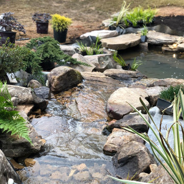 Backyard water feature, how to use the lay of the land to your advantage!