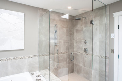 Design ideas for a large transitional master bathroom in Other with a drop-in tub, an alcove shower, gray tile, porcelain tile, grey walls, porcelain floors, grey floor and a hinged shower door.