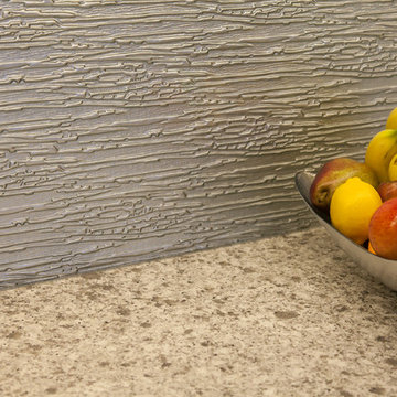 Custom textured, Back painted glass in silver metallic.
