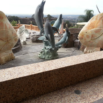 Stone Pride material - Installed: Turkish red marble mosaics, pool deck area