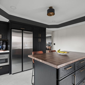 Dark & Moody Cabinets Bring Today’s Design Trends into the Kitchen