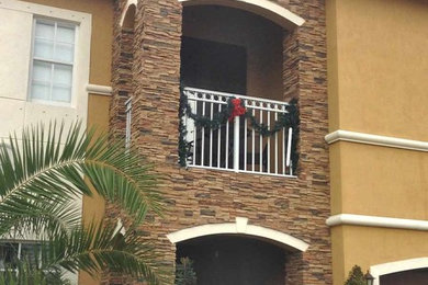 Example of a tuscan exterior home design in Miami