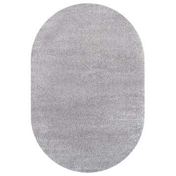 Haze Solid Low-Pile Gray 6 ft. x 9 ft. Oval Area Rug