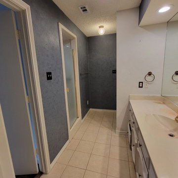 Two separate bathrooms converted into a master bathroom with a big open closet