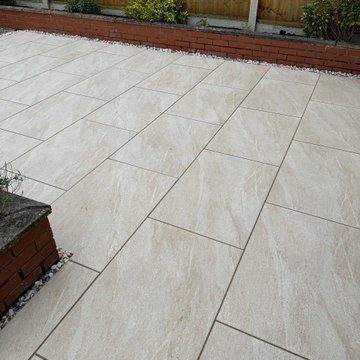 Ivory Porcelain Laid Up to a Brick Raised Border