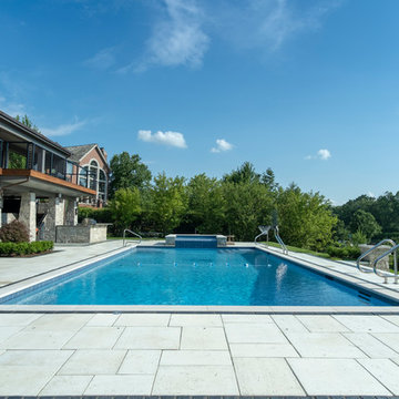 Burr Ridge Lap Pool with Raised Hot Tub and Waterfall
