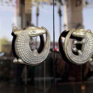 Helios custom brass alligator door handles for the Orleans Casino