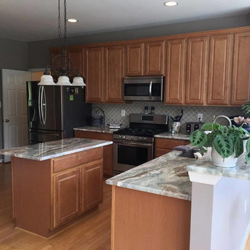 Fantasy Brown marble kitchen by The Beveled Edge