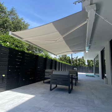 Contemporary Poolside Retractable Awning Installation
