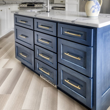 Navy Stained Island, Hood vent and Floating Shelves in White Shaker Kitchen
