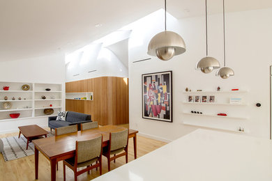 Inspiration for a mid-sized contemporary l-shaped light wood floor and beige floor open concept kitchen remodel in Dallas with flat-panel cabinets, gray cabinets, wood countertops, multicolored backsplash, cement tile backsplash, stainless steel appliances and two islands