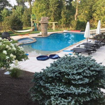 Beach Entry Pool with Cascading Water Feature & Slide