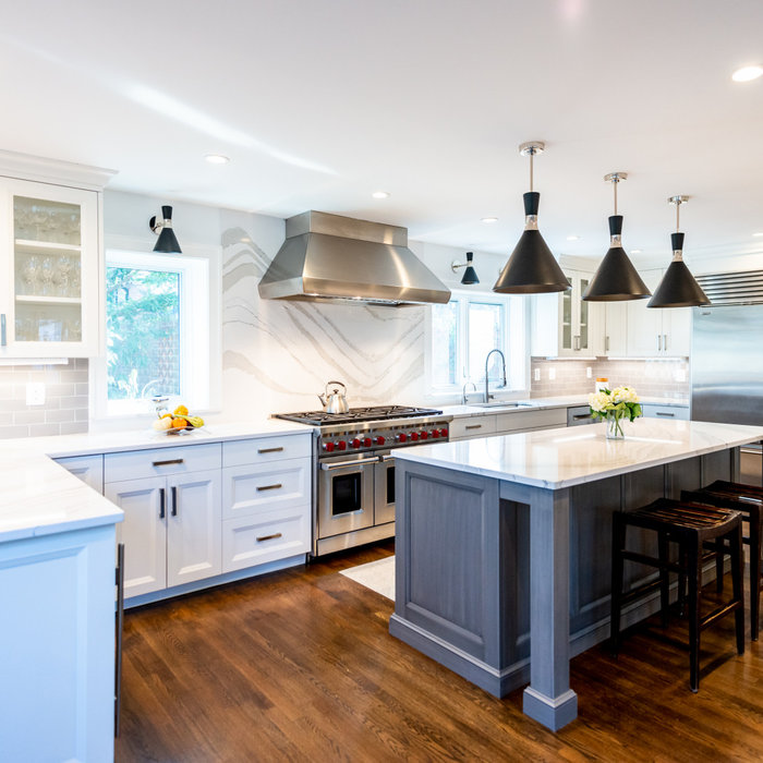 This remodeled and expanded Kitchen opens up and connects the space to the Dining Room.