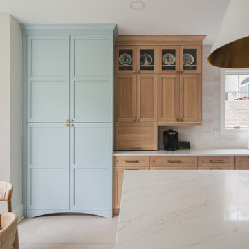 Scandinavian Kitchen with Light Oak Cabinets and Quartzite Island
