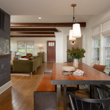Warm Open Kitchen with Blue/Gray/Green Cabinets and Dark Wood