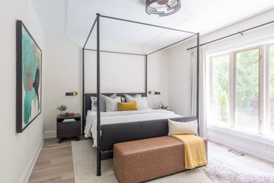 Mid-sized minimalist master medium tone wood floor and gray floor bedroom photo in Toronto with beige walls and no fireplace