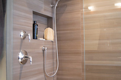 Photo of a contemporary bathroom in Denver with beige tile.